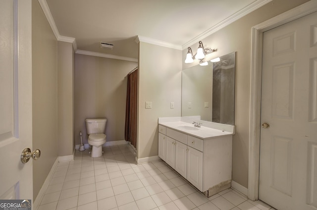 bathroom featuring vanity, crown molding, tile patterned floors, and toilet