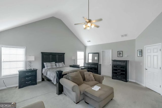 carpeted bedroom featuring high vaulted ceiling and ceiling fan