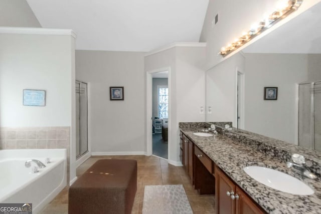 bathroom featuring vanity, tile patterned floors, and plus walk in shower