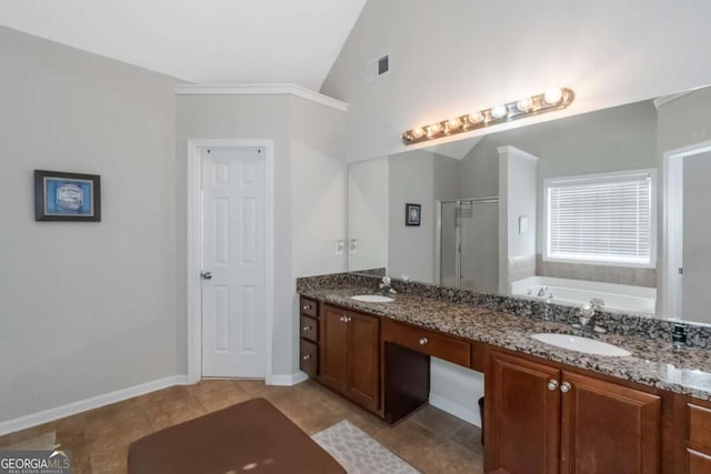 bathroom featuring lofted ceiling, vanity, tile patterned floors, and plus walk in shower