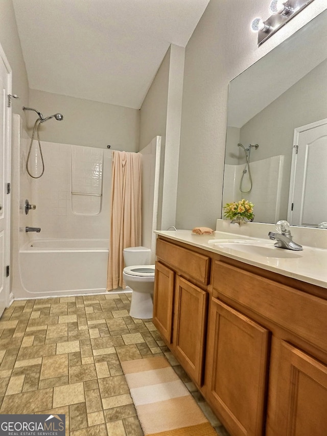 full bathroom featuring vanity, toilet, and shower / bath combo with shower curtain