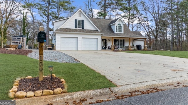 cape cod-style house with a garage and a front yard