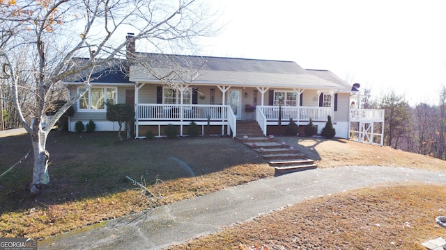 single story home with covered porch