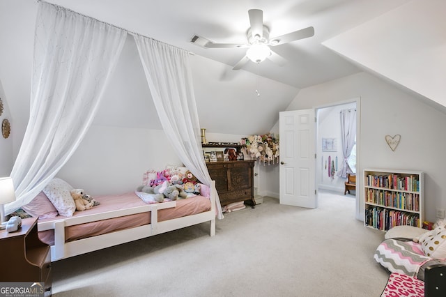 bedroom with vaulted ceiling, carpet, and ceiling fan