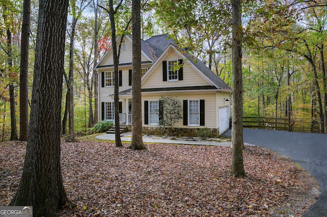 view of front of property with a garage