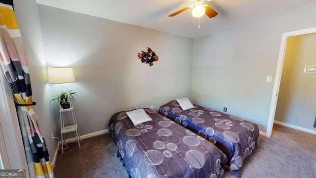 bedroom featuring ceiling fan and carpet flooring