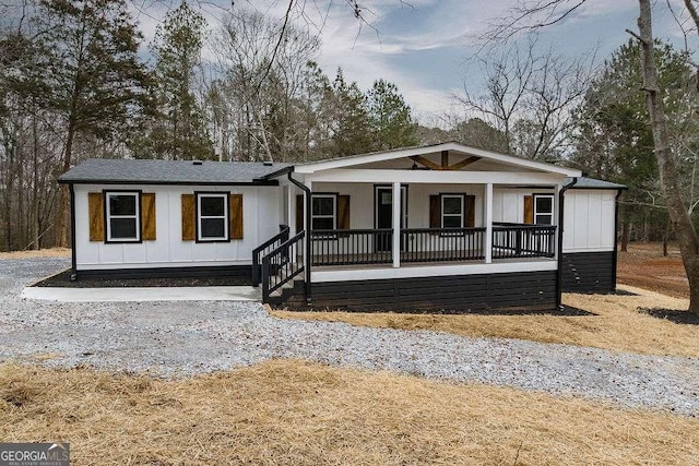 manufactured / mobile home featuring covered porch