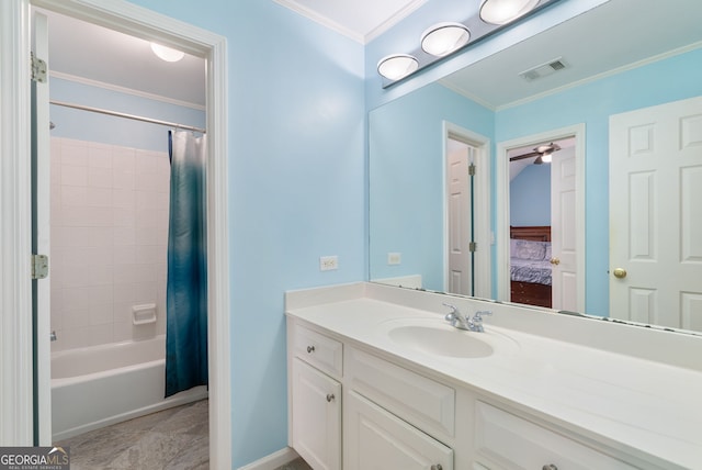 bathroom featuring crown molding, shower / bath combo, and vanity