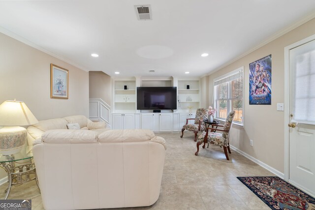 living room with crown molding and built in features