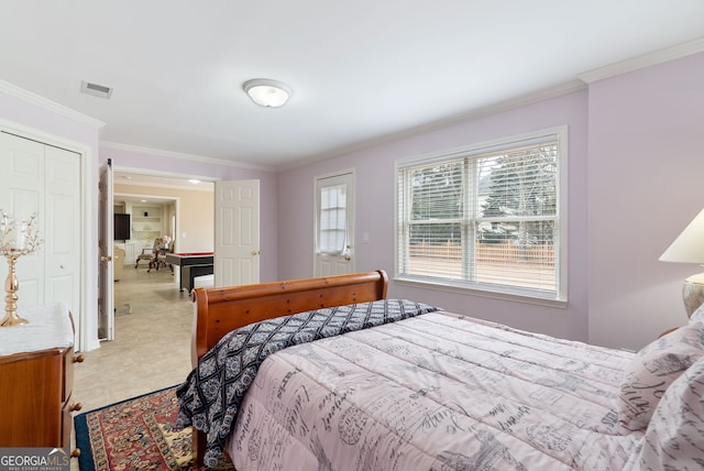 bedroom with ornamental molding