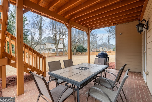 view of patio with a grill