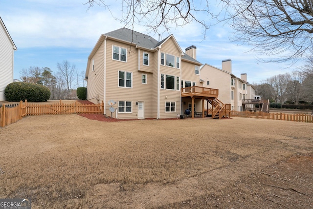 rear view of property with a deck