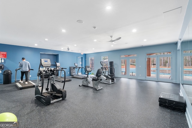 gym with ceiling fan and french doors