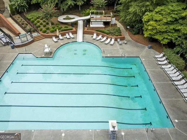 view of swimming pool featuring a patio area