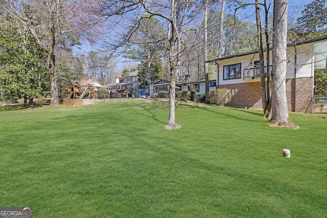 view of yard featuring a playground