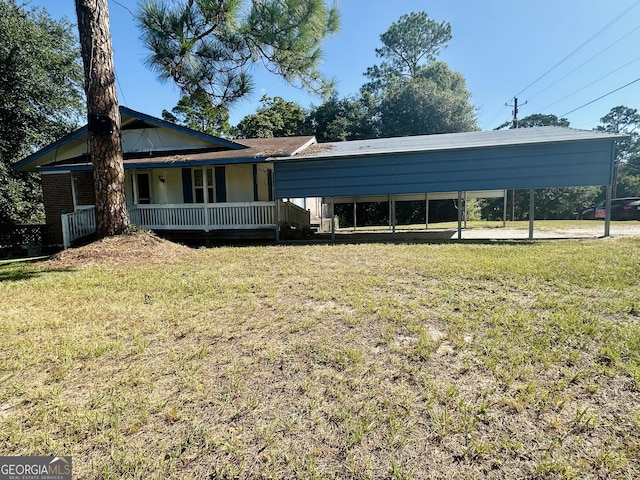 view of front facade with covered porch and a front lawn