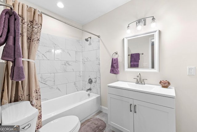 full bathroom featuring vanity, toilet, and shower / bath combo with shower curtain