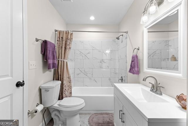 full bathroom with vanity, toilet, and shower / tub combo with curtain