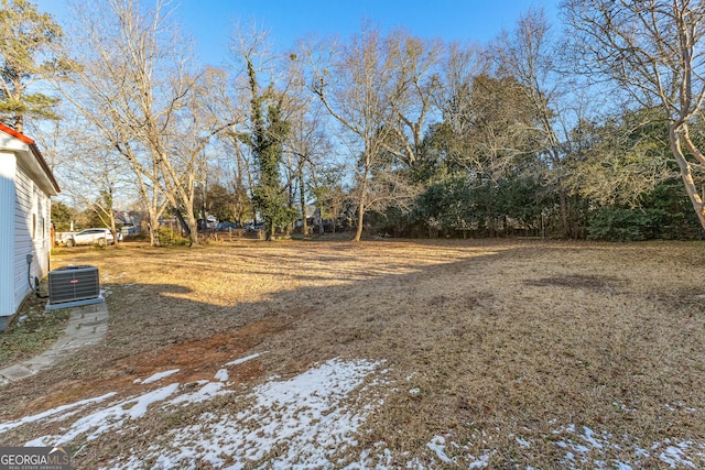 view of yard with central AC