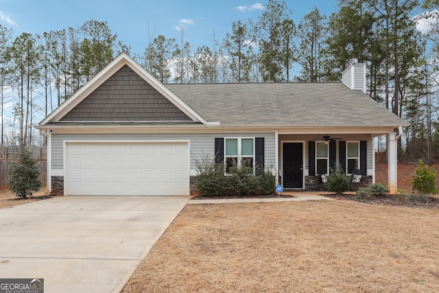 view of front of home featuring a garage and covered porch