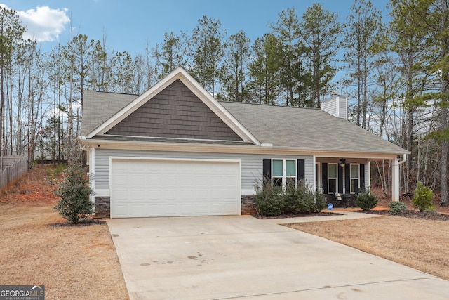 view of front of property featuring a porch and a garage