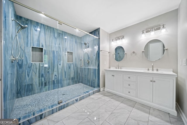 bathroom with an enclosed shower and vanity