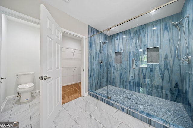 bathroom with toilet and walk in shower