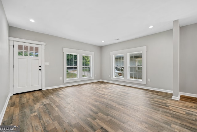 foyer with dark hardwood / wood-style floors