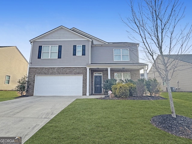 view of front of property with a garage and a front lawn