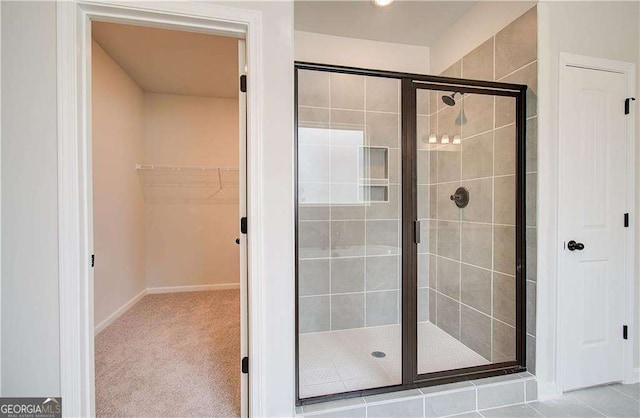 bathroom with an enclosed shower