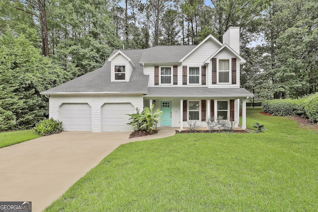 view of front of house with a garage, a front lawn, and covered porch