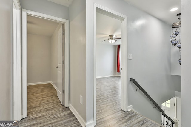 corridor featuring hardwood / wood-style floors