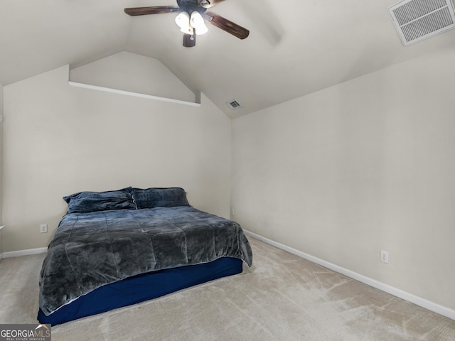 carpeted bedroom featuring ceiling fan and lofted ceiling