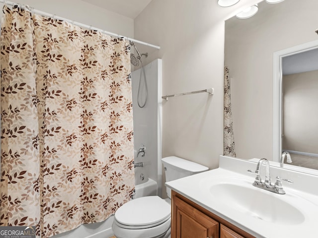 full bathroom featuring vanity, toilet, and shower / bath combo