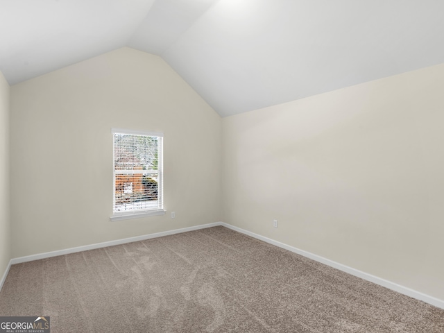 bonus room featuring lofted ceiling and carpet flooring