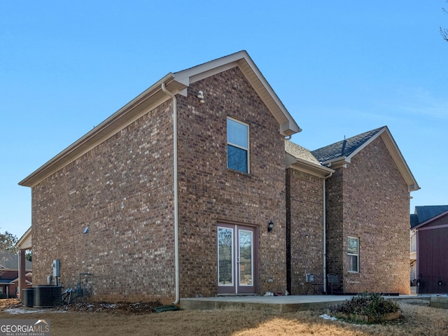 view of home's exterior featuring central AC unit