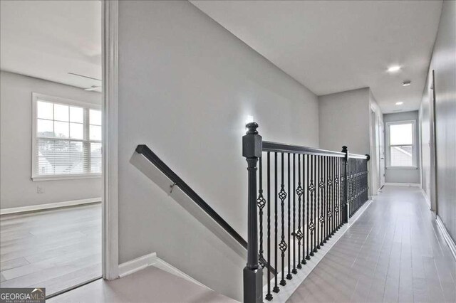 staircase featuring hardwood / wood-style floors