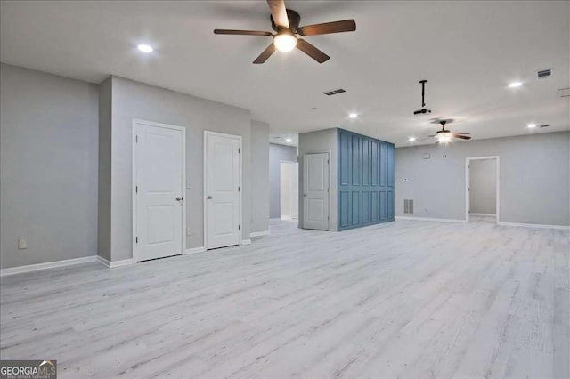 interior space featuring ceiling fan and light wood-type flooring