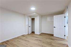 hallway featuring light hardwood / wood-style flooring