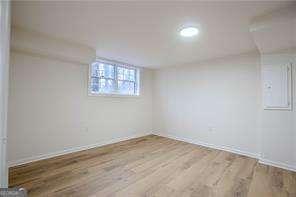 unfurnished bedroom featuring light wood-type flooring