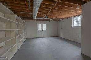 unfurnished room featuring hardwood / wood-style flooring