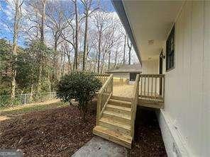 basement with hardwood / wood-style flooring