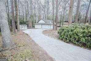 view of yard with a garage