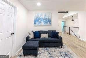 living room with hardwood / wood-style flooring