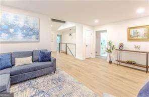 living room with wood-type flooring