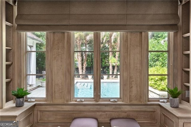 interior space with an inviting chandelier, visible vents, ornamental molding, french doors, and dark wood finished floors