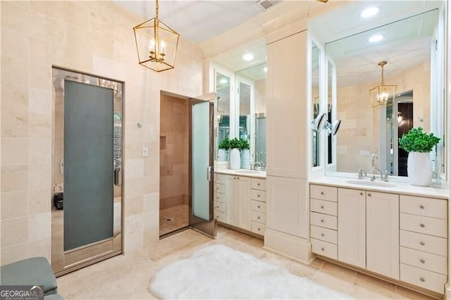 hall featuring track lighting, a decorative wall, plenty of natural light, and dark wood-style floors