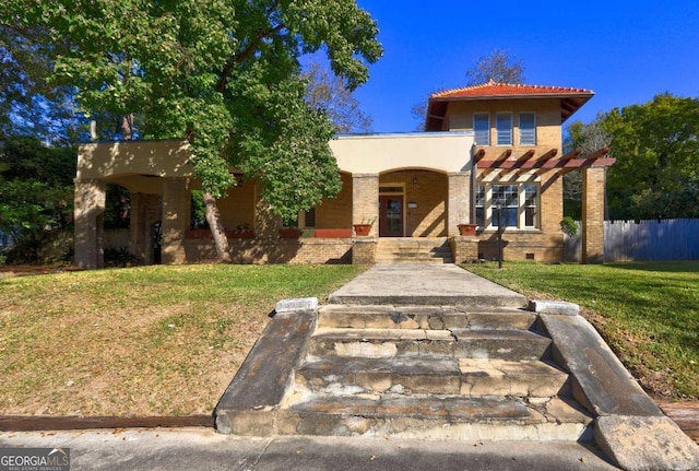 view of front of house with a pergola and a front yard