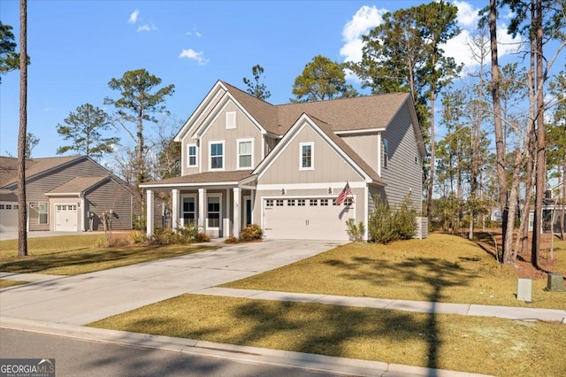 view of front of house with a garage and a front yard