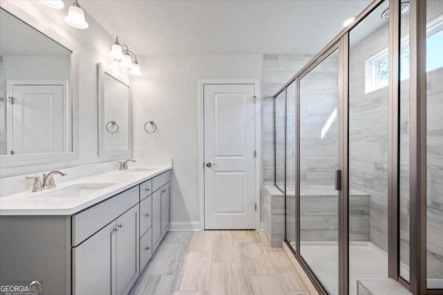 bathroom featuring vanity and walk in shower